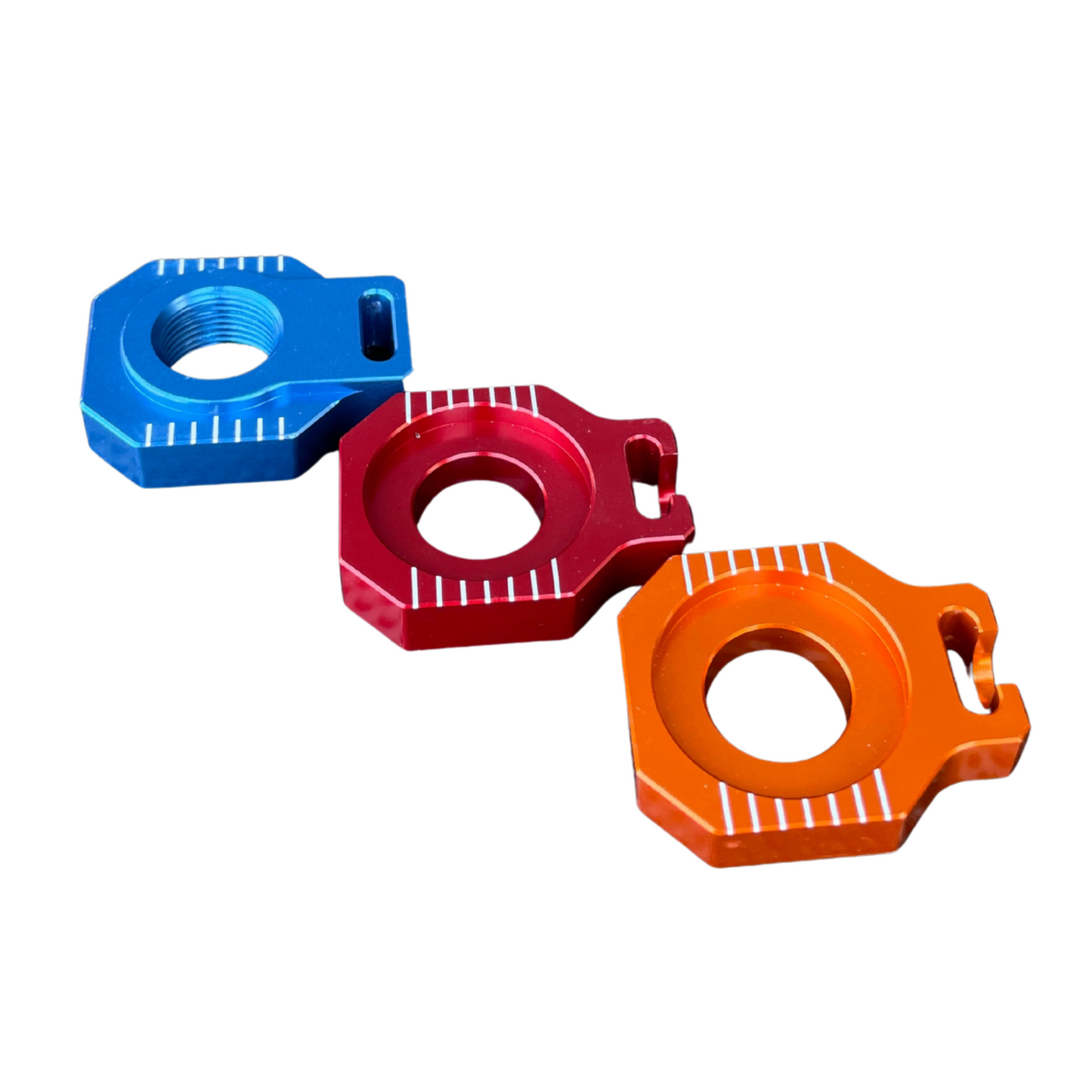 CNC Achsblöcke Kettenspanner in Blau, Rot und Orange für KTM, Husqvarna, GasGas, Husaberg